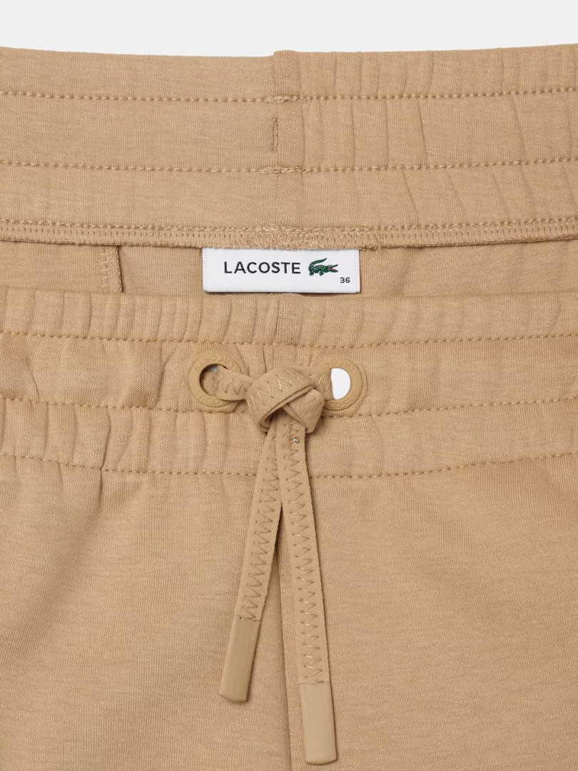 Cal�as de fato de treino Lacoste