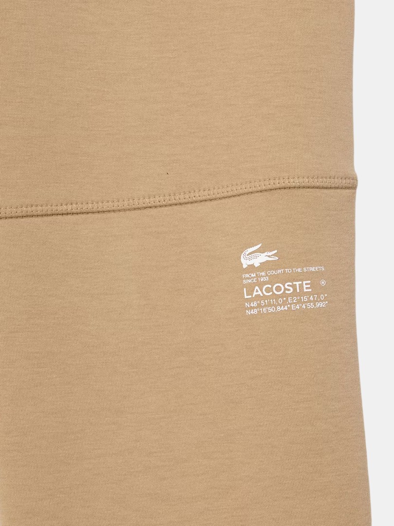 Cal�as de fato de treino Lacoste