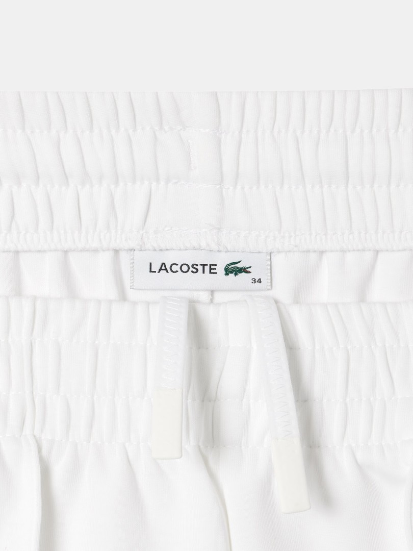 Cal�as de fato de treino Lacoste