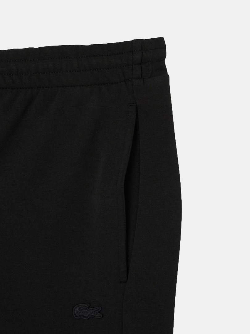 Cal�as de fato de treino Lacoste