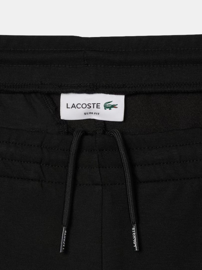 Cal�as de fato de treino Lacoste